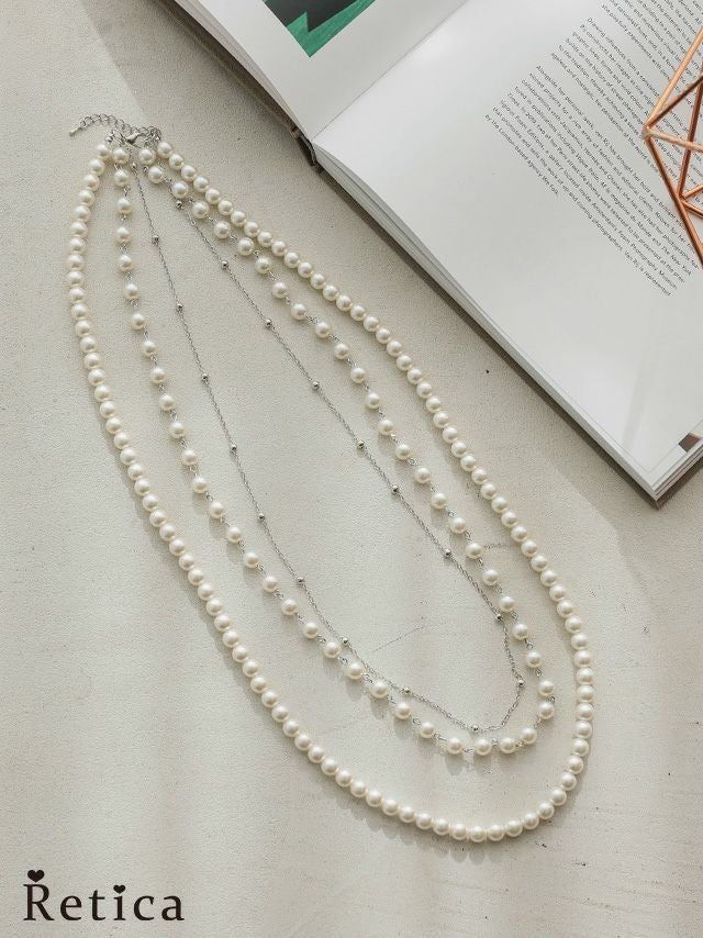 myMinette マイミネット 三連パールロングネックレス